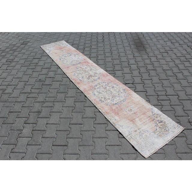 This beautiful, traditional vintage, hand knotted Turkish runner is approximately 60 years old. It is handmade of very...