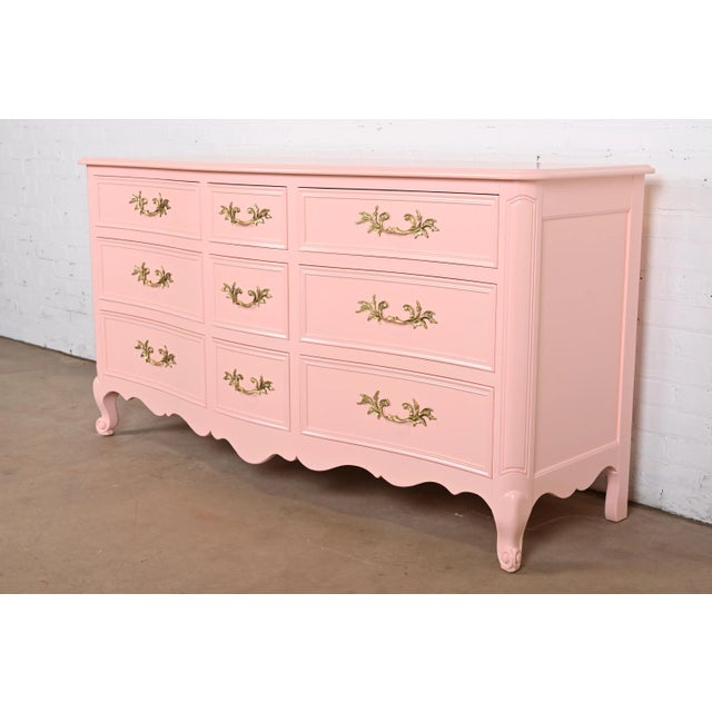 An exceptional French Provincial Louis XV style nine-drawer dresser or chest of drawers By Kindel Furniture USA, Circa...