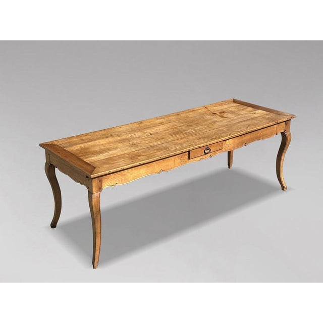 Charming Mid-19th Century French Fruitwood Farmhouse Dining Table with Beautiful Warm Patina, Seating 8 Bring authentic...