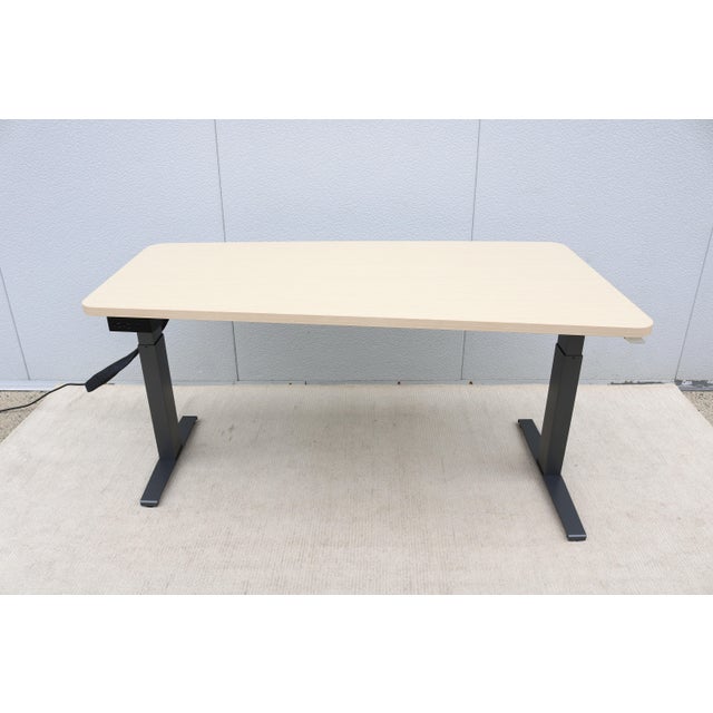 Elegant Motia Ergonomic Sit-to-Stand table desk/work center by Herman Miller. An electric adjustable height worktable that...