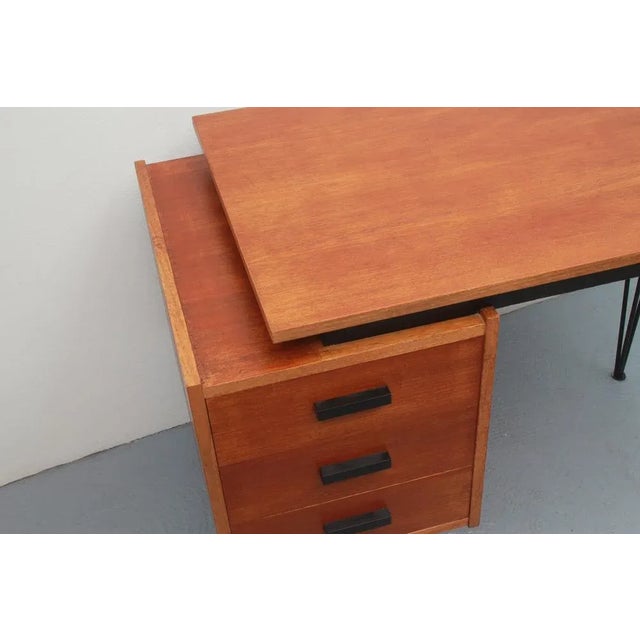 Small 50s Hairpin desk. Design Tijsseling for Tijsseling Nijkkerk. Made in Netherlands. Execution in teak with 3 drawers....