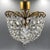This elegant ceiling lamp from the 1920s/1930s embodies the Art Deco style, known for its luxurious materials and...