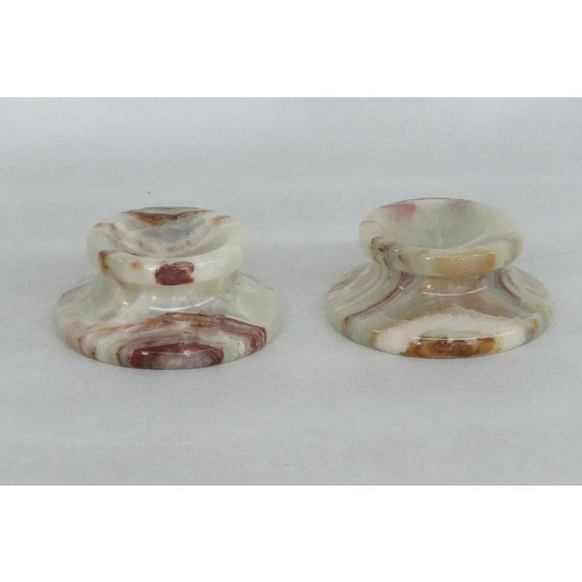 This beautiful pair of candle holders is made of glass. These two candle holders have great style with classic slightly...
