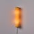 1940s Finnish Yellow Cylindrical Glass and Metal Plug-in Wall Lamp in the Manner of Paavo Tynell A highly refined wall...