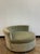 Circa 1970, plush sage green upholstery, single loose cushion, raised on four short turned wood feet, unmarked. Milo...