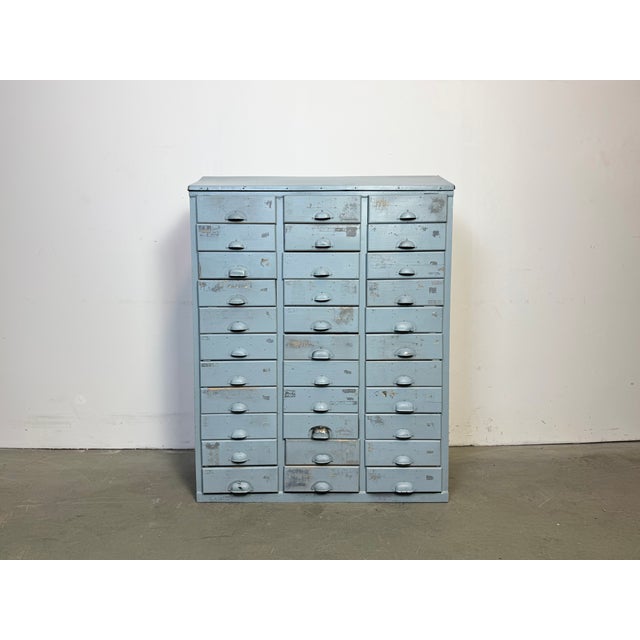 This vintage Industrial iron chest of drawers was made in former Czechoslovakia during the 1960s. It features an iron...