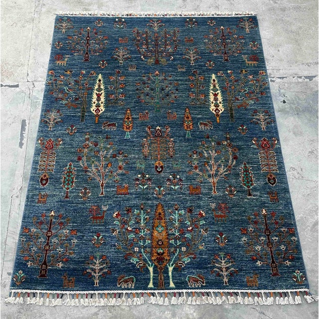 Description: Celebrate artistry and tradition with this Vintage Persian Gabbeh Wool Tree of Life Rug, a handwoven piece...