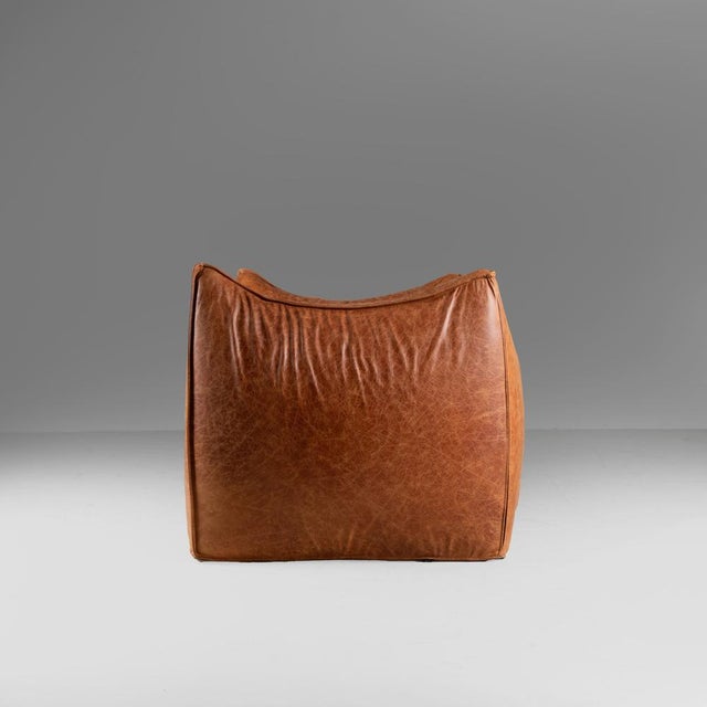 Brown Le Bambole Chair by Mario Bellini for B&B Italia, 1970, in Good conditions. Designed 1960 to 1969 This piece has an...