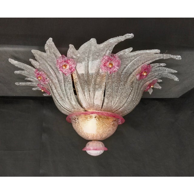 Ceiling lamp in murano glass worked in plate and by hand with dew graniglia applied by fire with pink and gold flowers...