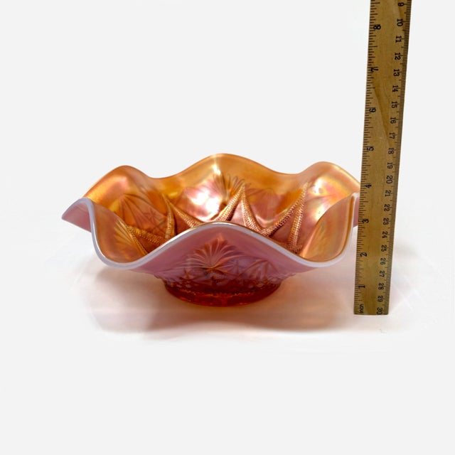 Overview: Up for sale is a stunning vintage Dugan Glass Company bowl crafted in the iconic "Ski Star" pattern. This large...