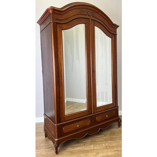 Introduce classic French elegance into your bedroom with this beautiful Antique French Walnut Wardrobe, featuring a...