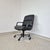 A striking vintage executive swivel chair designed in the distinctive style of Charles Pollock for Comforto, with a wide,...