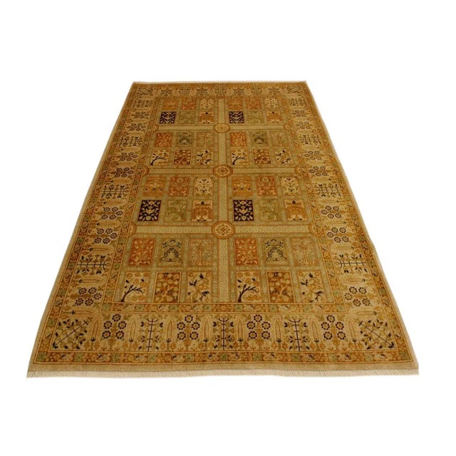 Designed with a mesmerizing intricate traditional motif this glorious hand knotted rug is a masterpiece that will fill any...