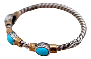 Gold Bracelet and Paw