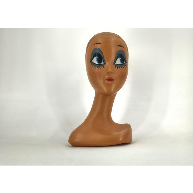 Painted plastic Twiggy hat head, representing the famous iconic English model of the 1960s, Lesley Hornby, aka Dame Lesley...