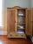 This lovely piece is a French wardrobe, or linen press dating from the late 19th century. Crafted from pine, it has a soft...