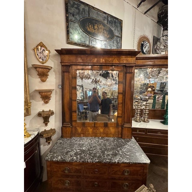 These 19th c. Italian Empire Walnut Mirrors are classic and elegant pieces that would make a stunning addition to any...