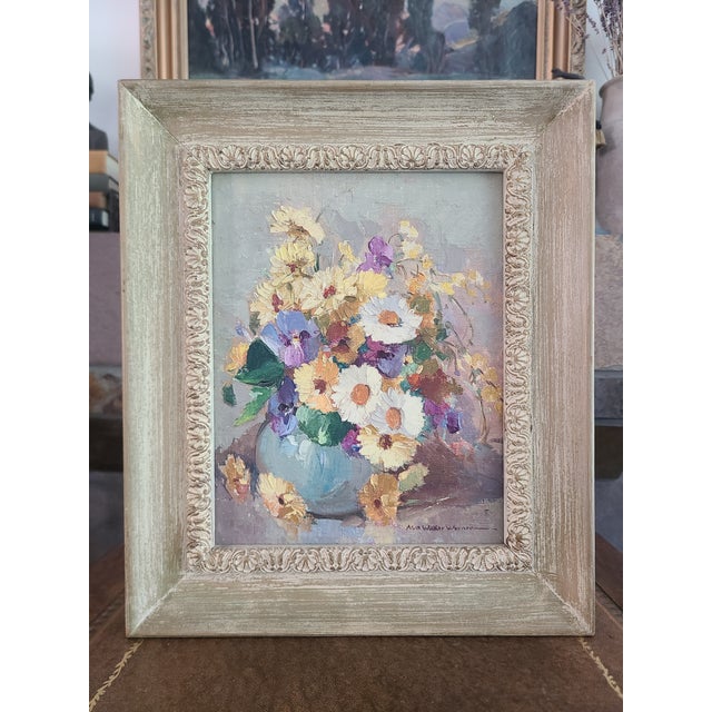 Original still life oil painting by California artist Nell Walker Warner (1891-1970) depicting a bouquet of daisies and...