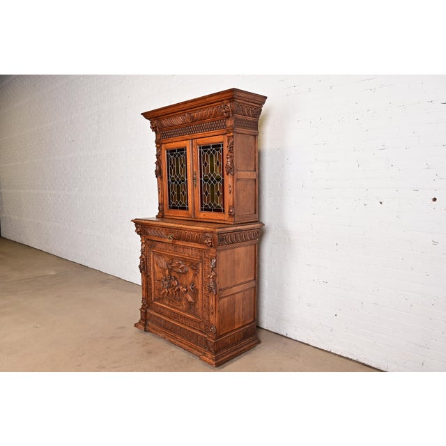 French Antique French Renaissance Revival Carved Oak Breakfront Bookcase or Bar Cabinet With Stained Leaded Glass Doors, Circa 1890s For Sale - Image 3 of 14