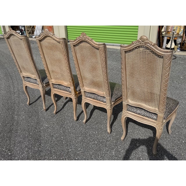 Offering One Of Our Recent Palm Beach Estate Fine Furniture Acquisitions Of A Set of 4 Vintage French Country Caned Back...