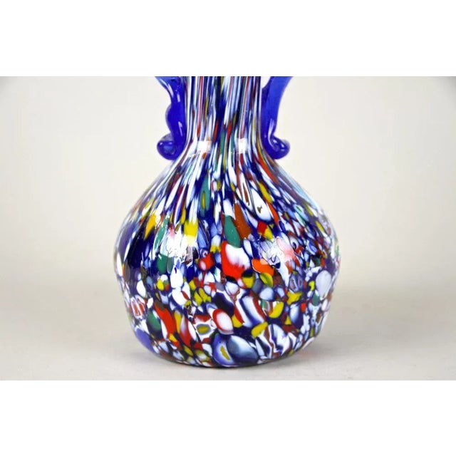 Colorful, unusual Murano glass vase from the workshops of Fratelli Toso around 1940/50. Elaborately hand crafted in the...