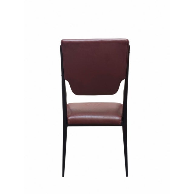 An elegant head-of-the-table armchair by Dassi Mobili Moderni, an excellent example of mid-century modern Italian design...