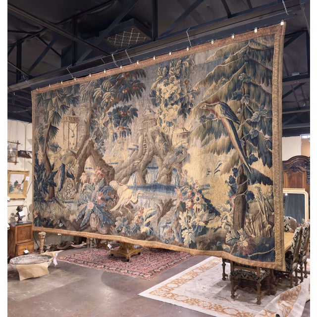 This exquisite antique tapestry was handwoven in Aubusson, France, circa 1760, and exemplifies the refined artistry and...
