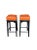 An outstanding pair of bar stools with new finish and upholstery. The stools' design is in the eccentric style of James...