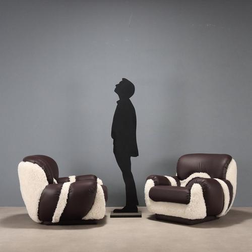 Pair of vintage Italian-made armchairs, recently refurbished, with foam padding and brown faux leather and white fur...
