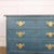 Pretty 18th century English painted four drawer chest of drawers with a brushing slide. 1780. This piece is designed in...