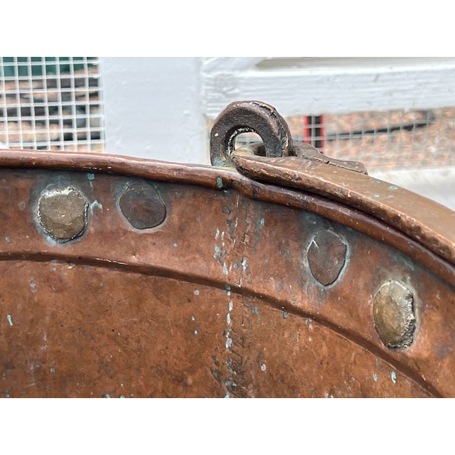 Huge Antique Copper Cauldron: Hand Forged Firewood Bucket 19" With Hand Etched Riveted Handle Green Patina Damage For Sale - Image 6 of 14