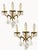 A refined pair of wall lamps in the authentic King Umberto of Savoy style, crafted from finely chiseled bronze and...
