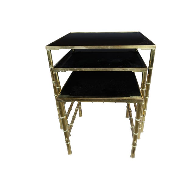 Set of three (3) Mid-Century Modern gilt metal faux bamboo nesting table with amethyst glass tops largest measures:...