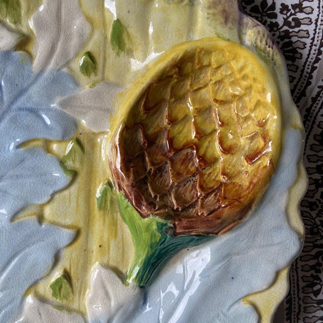 An exquisite late 19th-century majolica / barbotine plate, beautifully molded with a high-relief artichoke and large...
