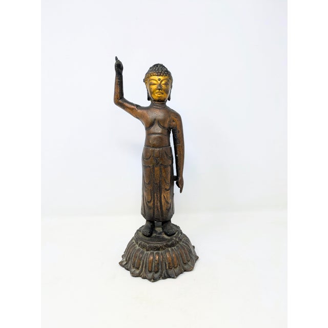 Traveling Man Treasures Curiosity Vault has this fine bronze Korean statue of Baby Buddha pointing to heaven and earth....