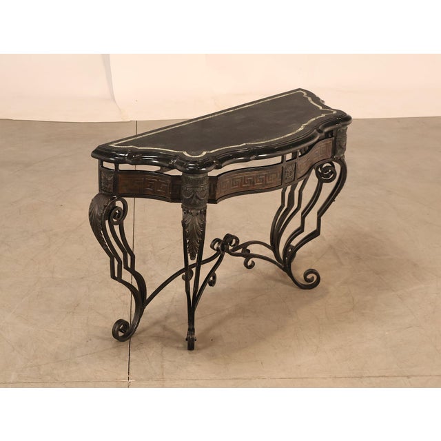 High Quality Coastal Style Maitland Smith Console Table Featuring An Elegant Black Marble Top With Decorative Inlaid...