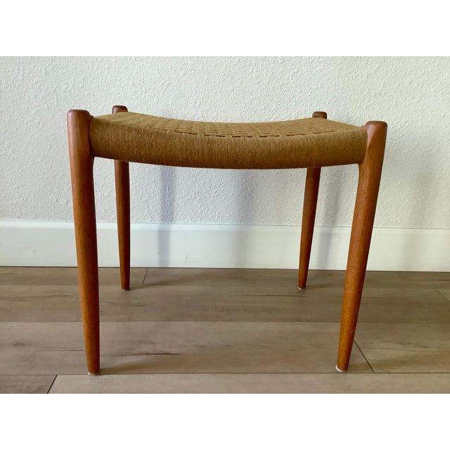 An exceptionally rare Danish Modern stool by N. Møller Models, Model 80A, made in Denmark. Crafted from solid teak with...