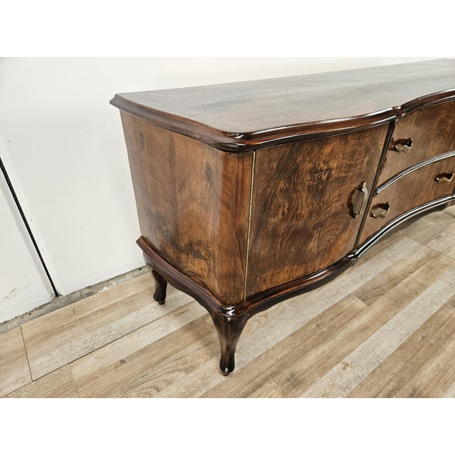 A 1940s dressing table or entryway piece, made in Italy in the Chippendale style. Very elegant and refined, note the...