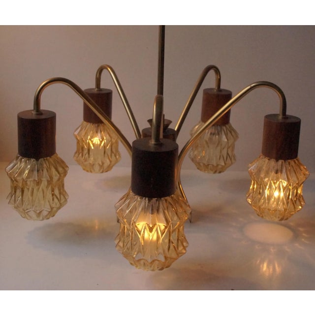 This mid-century Modern chandelier was manufactured in Denmark during the late 1950s in a style inspired by French and...