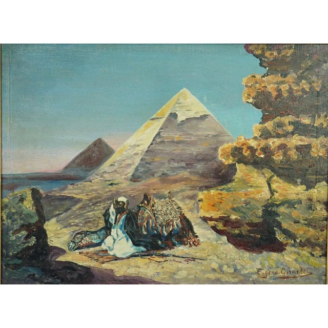 Description of the item: Orientalist painting, oil on canvas, depicting an Egyptian landscape with an Arab praying with a...