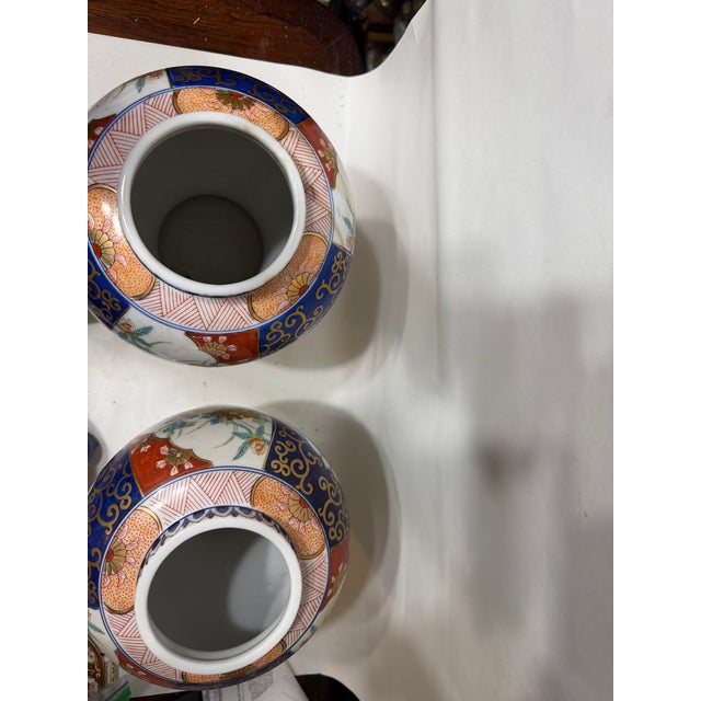 Pair of Japanese Imari Porcelain Covered Vases / Ginger Jars With Lids by l.j Japanese made , beautifully hand-painted in...