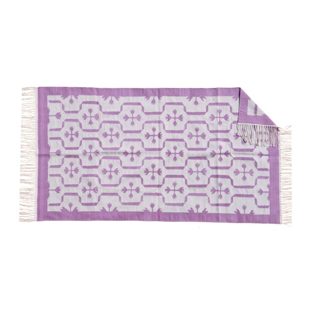 Presenting our Regal Dalia Collection! Made from naturally dyed 100% cotton yarn, these dhurrie rugs have been handwoven...