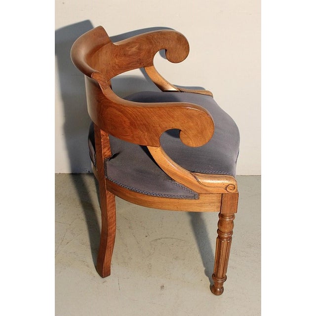 Office armchair Louis Philippe in blond walnut. It is suitable for all morphologies due to its curved file which offers...