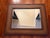 A distinctive vintage leather mirror with a strong equestrian, British Colonial, and Ralph Lauren–inspired aesthetic. The...