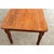 English 19th century dining table made of pine rippling in soft texture and color, ideal for six guests with room up to...