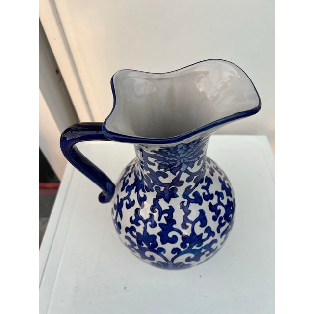 Vintage Blue & white ceramic pitcher that could also be used as a vase. A perfect fit for the modern home, rustic country...