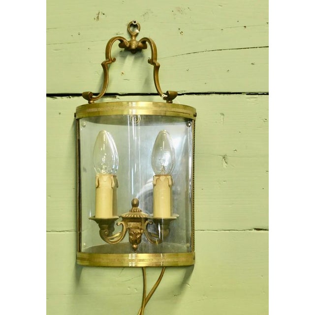 French Provincial Twin Light Wall Lantern A French Twin Light Brass Curved Wall Lantern This is an elegant light it hold 2...