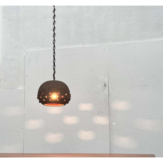 Brutalist studio ceramic pendant lamp from denmark. a functional lamp and at the same time an impressive object. The...