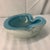 Elevate your tablescape or vanity with this captivating 1960s Murano art glass catchall bowl, expertly handcrafted in...