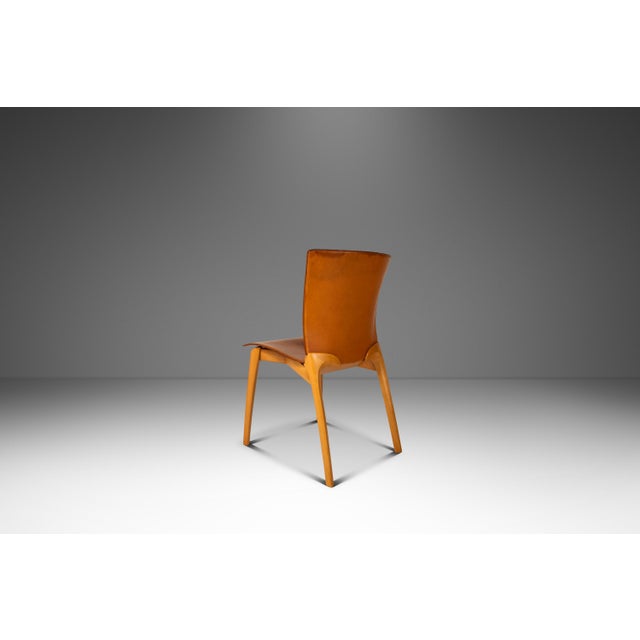 Introducing a rare, refined set of four patinaed 'Cos' dining or office chairs, designed by Josep Lluscà for the fabled...